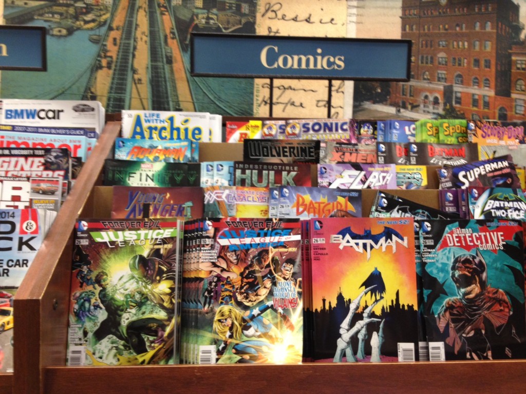 One of these things does not belong here: Justice League #26, on the rack early at the Court St. Barnes and Noble.